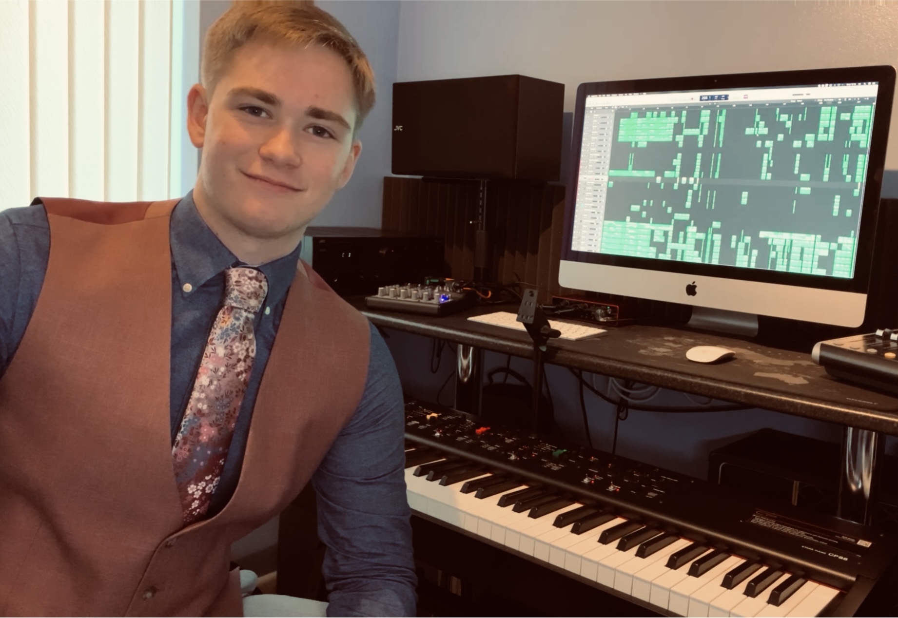 Joe by his keyboard.